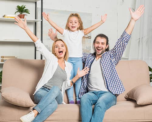 Happy Family Celebrating After Buying Their New Home in Texas